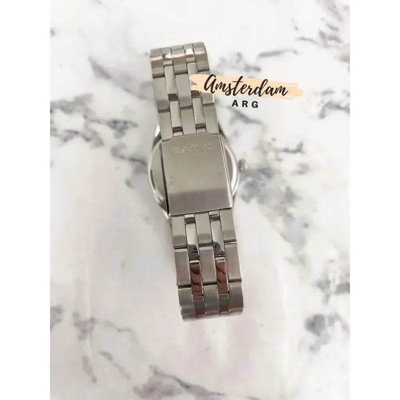 Reloj Casio Mtp-1335d Para Hombre Con Correa De Acero Plateado Y Fondo Azul
