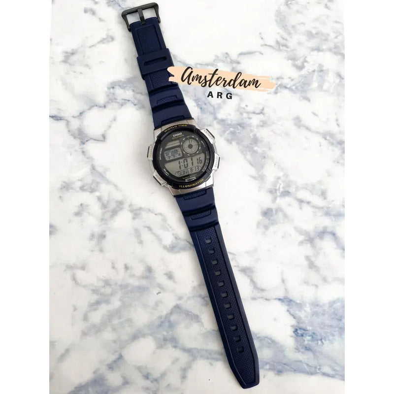 Reloj Casio Hombre Mod Ae-1000w Sumergible Malla Azul 2a Bisel Azul Fondo Negro