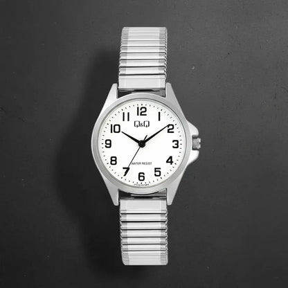 Reloj De Mujer Pulsera Elasticada Qyq C37a-023py Plateado Blanco