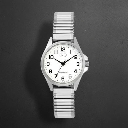 Reloj De Mujer Pulsera Elasticada Qyq C37a-023py Plateado Blanco