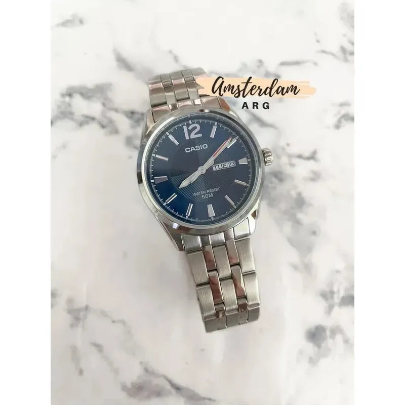 Reloj Casio Mtp-1335d Para Hombre Con Correa De Acero Plateado Y Fondo Azul