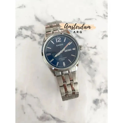 Reloj Casio Mtp-1335d Para Hombre Con Correa De Acero Plateado Y Fondo Azul
