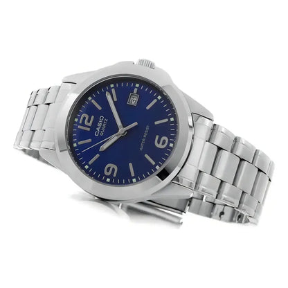 Reloj Pulsera Casio Mtp-1215 Con Correa De Acero Inoxidable Color Plateado - Fondo Azul