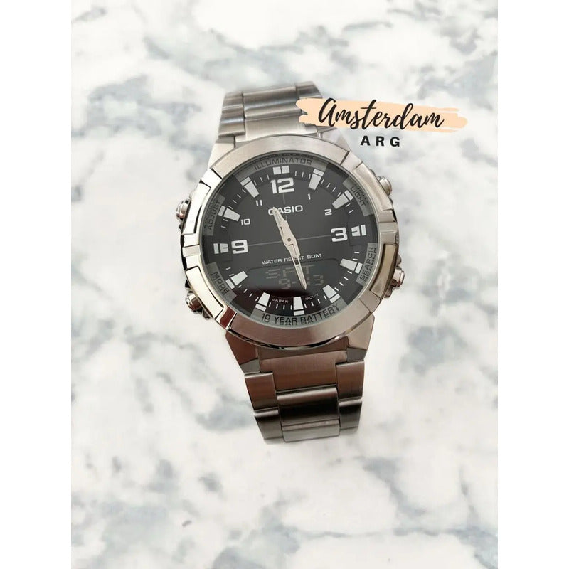 Reloj Casio Hombre Modelo Amw-870da Sumergible Malla Plateado Bisel Plateado Fondo Negro