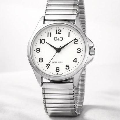 Reloj De Mujer Pulsera Elasticada Qyq C37a-023py Plateado Blanco